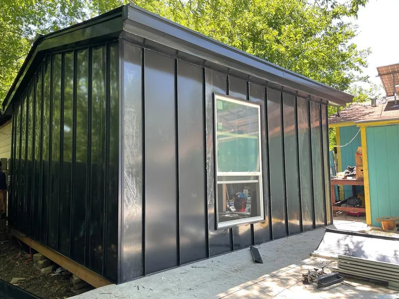 Black standing seam metal wall panels for Metal Roof Installation in Airmont