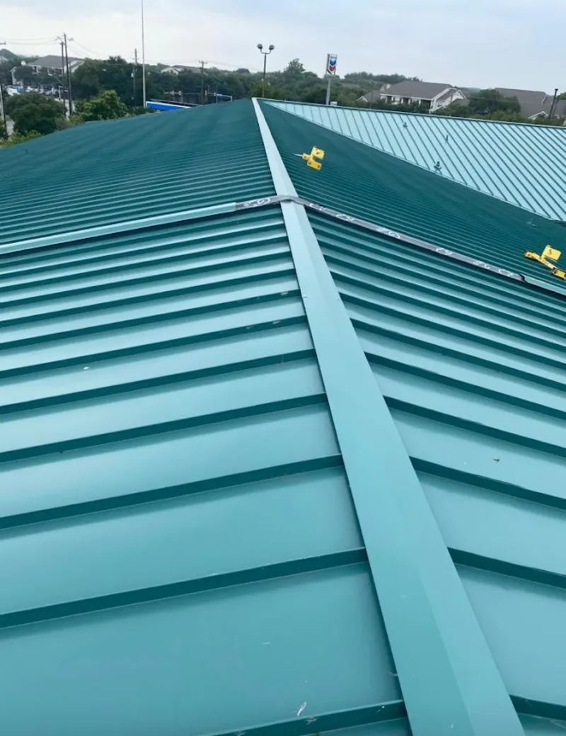 Green commercial metal roof ridge and valley for Metal Roof Repair in Airmont